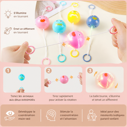 Balle toupie lumineuse et sifflante avec cordon de traction pour enfants