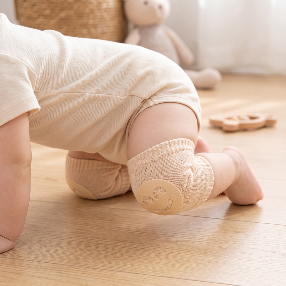 Genouillères pour bébé – Protection antidérapante avec motif visage souriant